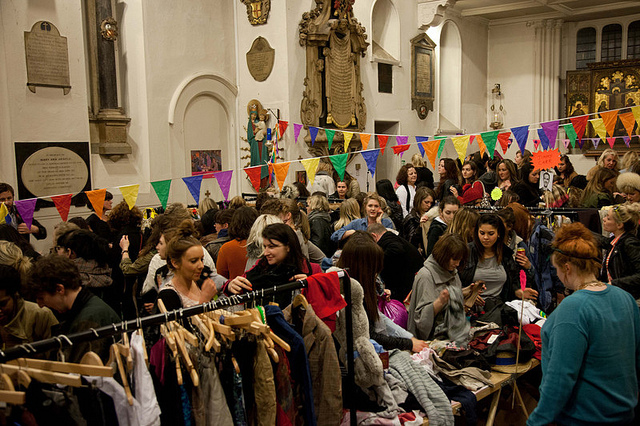 Jumble Sale with bunting and racks of clothes